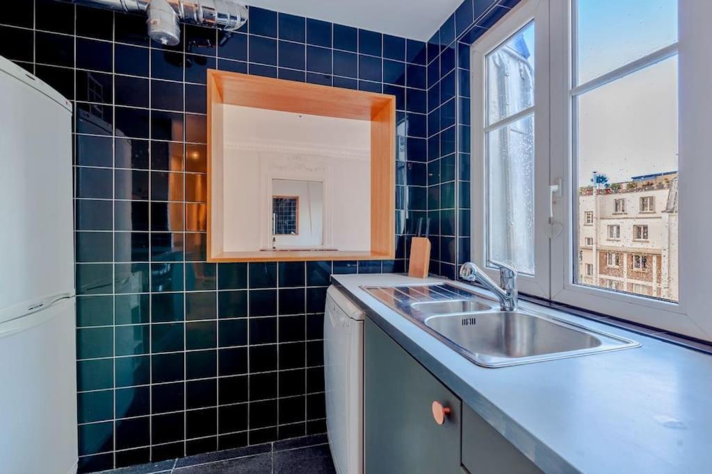 Charmant Appartement Au Coeur De Paris Exterior photo